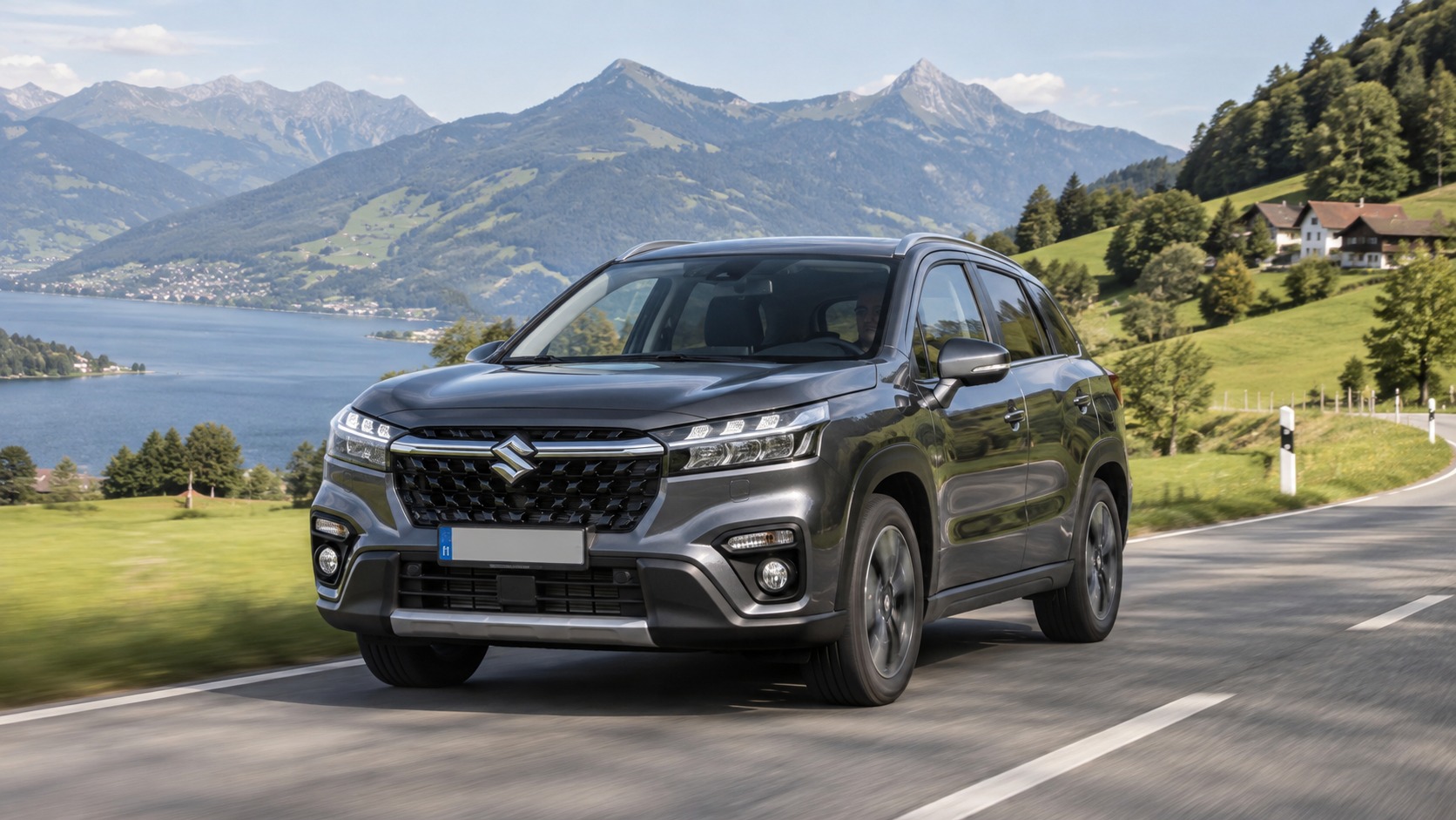 SUV auf Strasse in alpiner Landschaft.